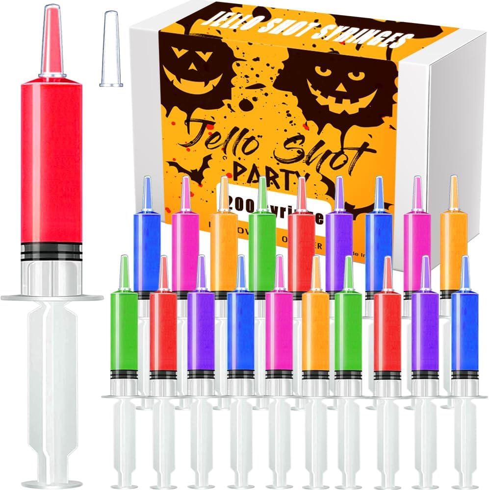 PISSION jello shot syringes displayed on a party table with colorful liquids